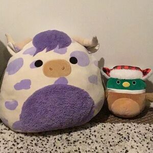Purple and Cream Cow Plush with Green and Brown Bird Plush